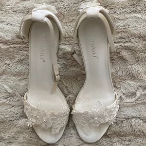 White floral accent bridal shoes